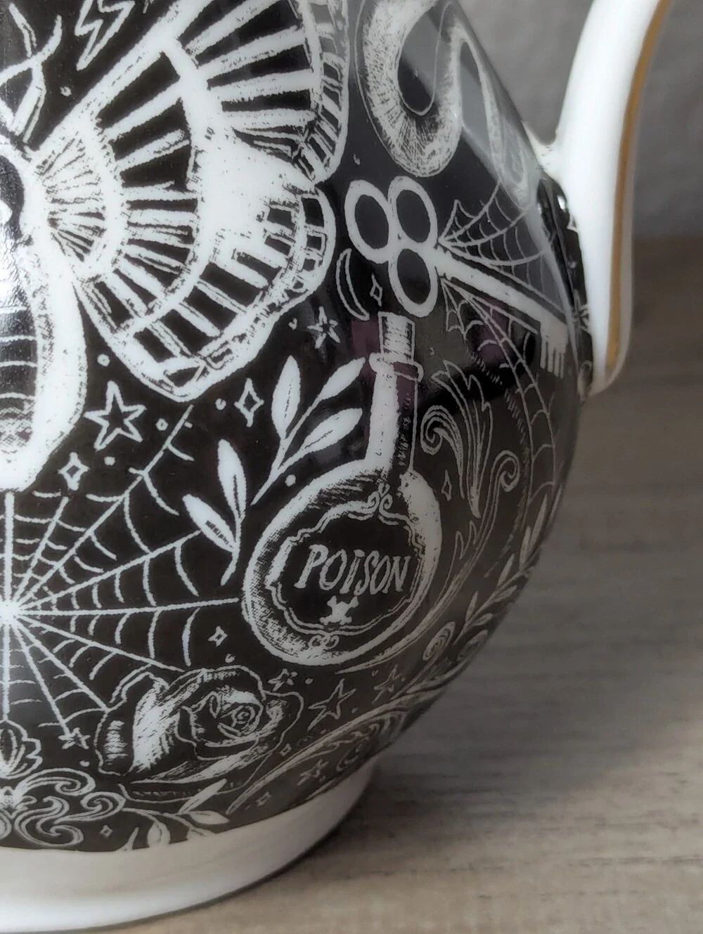 MONTEREY BAY Fine Porcelain Gothic Serving Pitcher With Moth Skull Design